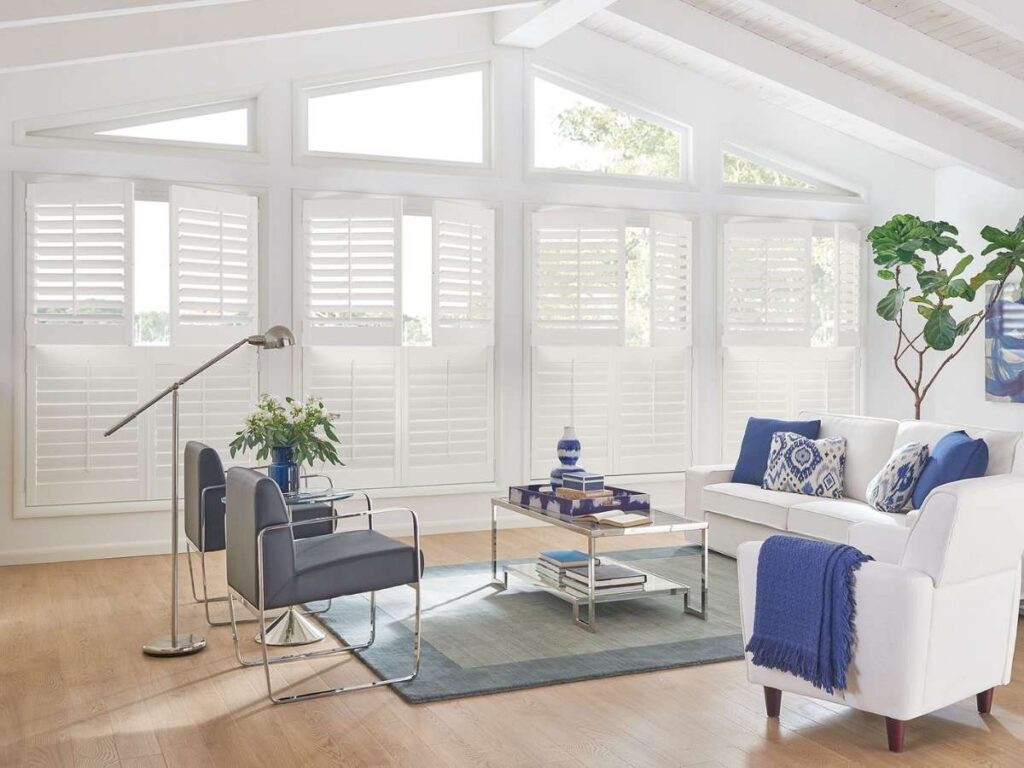 Interior shutters for light control in a cozy living space